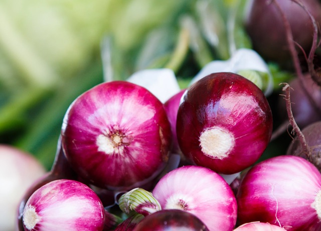 Peeled red onions.