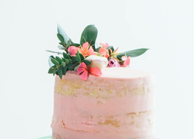 A cake topped with flowers.