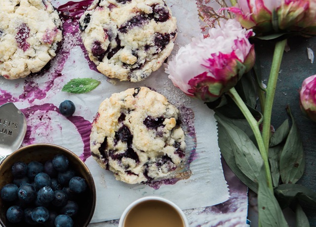 Blueberry cookies on parchment paper.